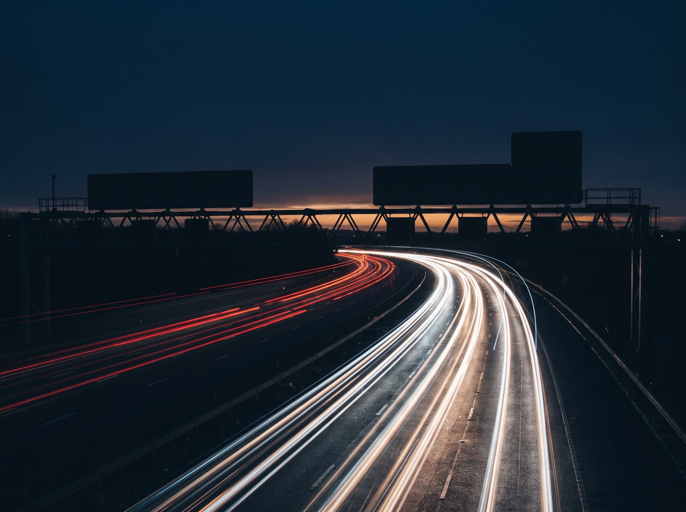 Motorway light trails at blue hour